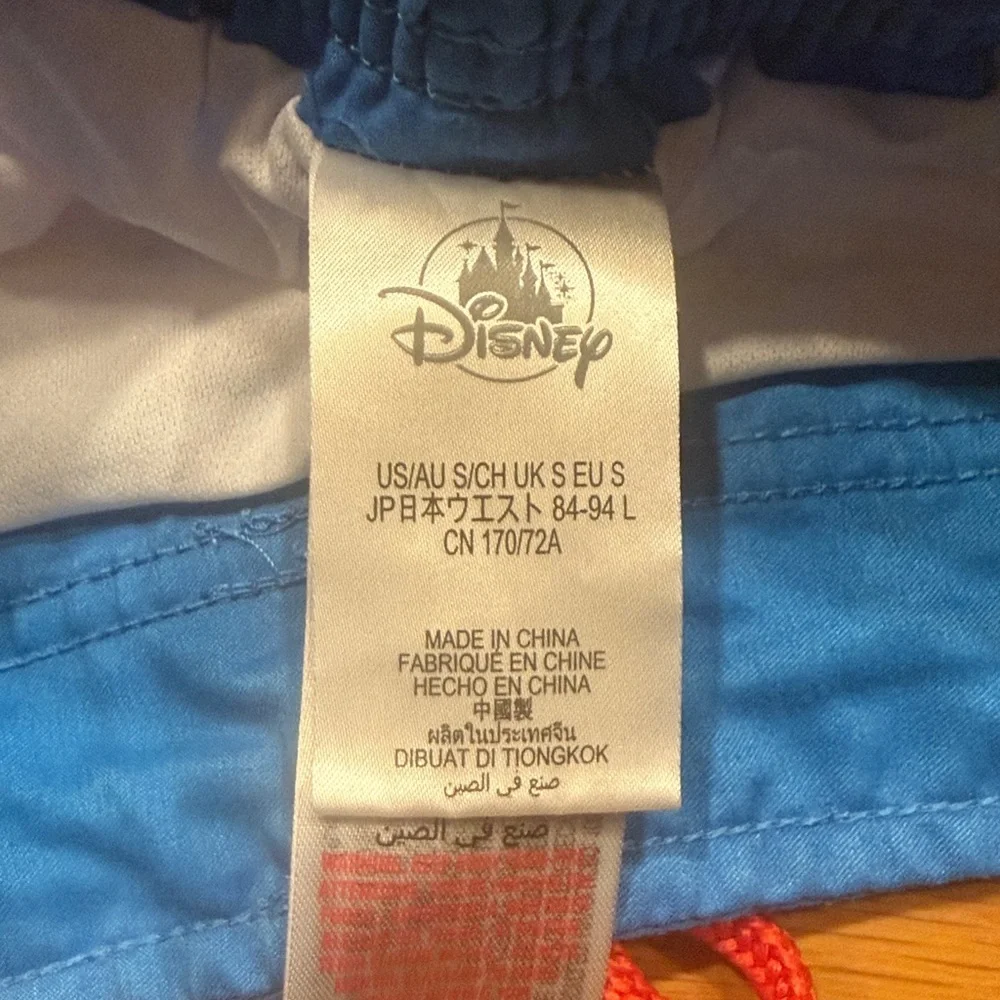 Disney store men’s swim shorts size small ,